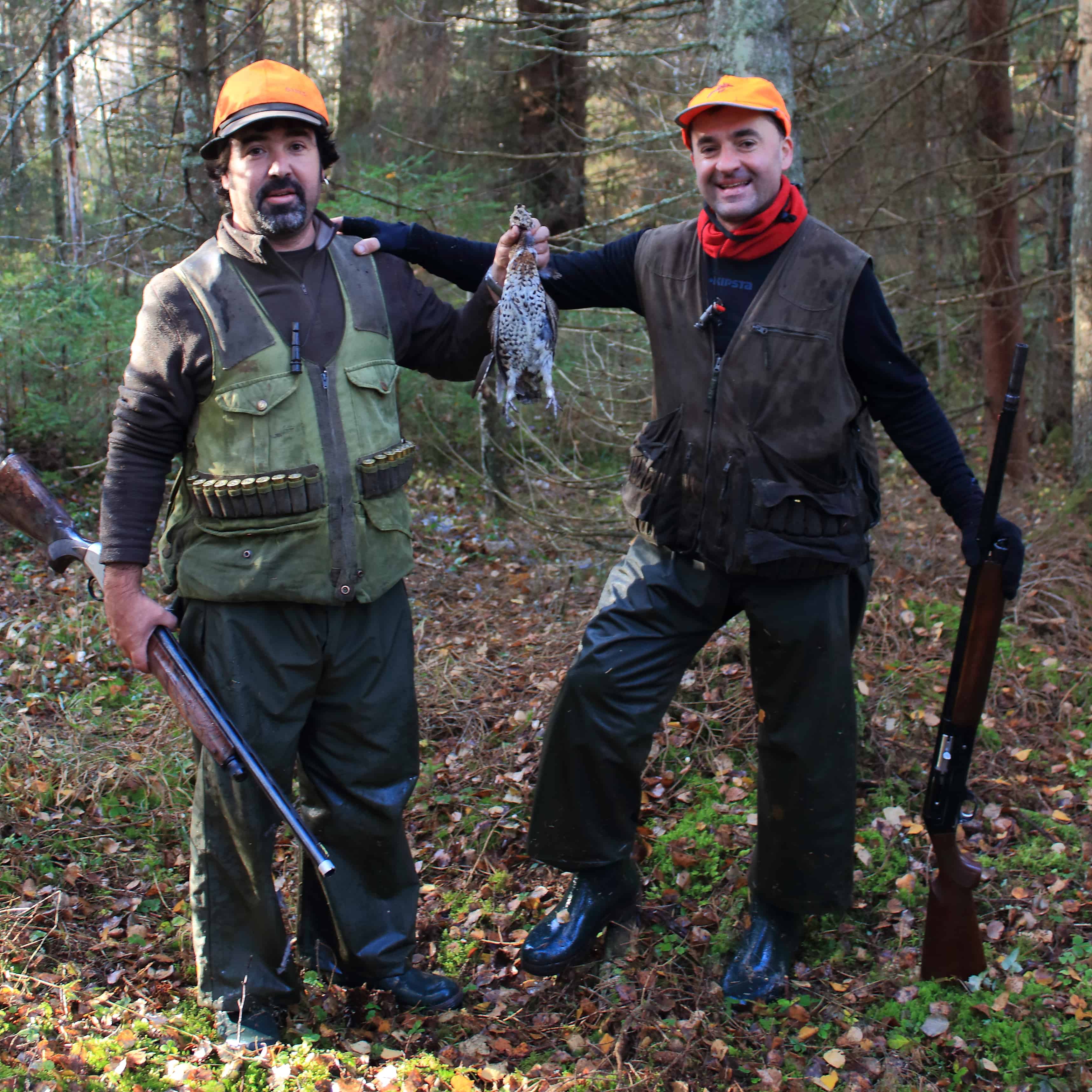 Dog with retrieved woodcock